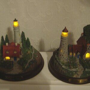 2 Thomas Kinkade lighted lighthouse scene figurines